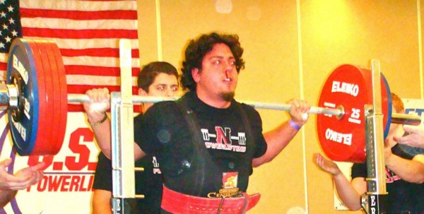 Drew pushing hard enough in the squat in the 2012 Massachusetts State Championships to pop a blood vessel in the nose.